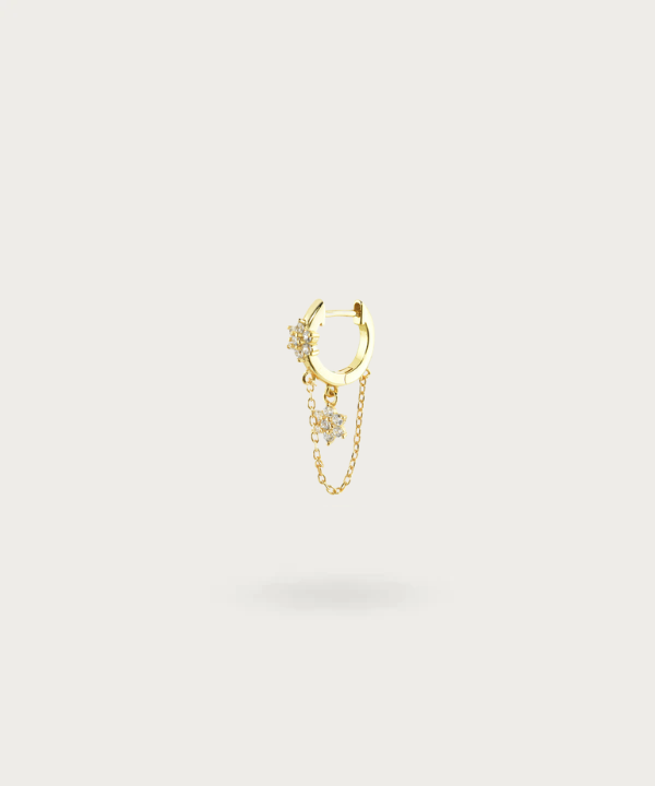 Ear Chain Flower Piercing in gold, with floral details on a white background