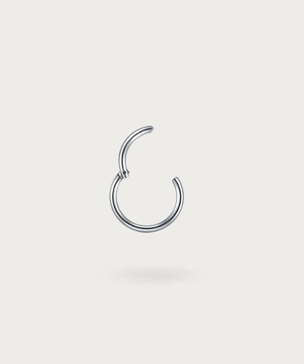 Close-up of the Paulina Forward Helix Hoop Piercing, silver clicker