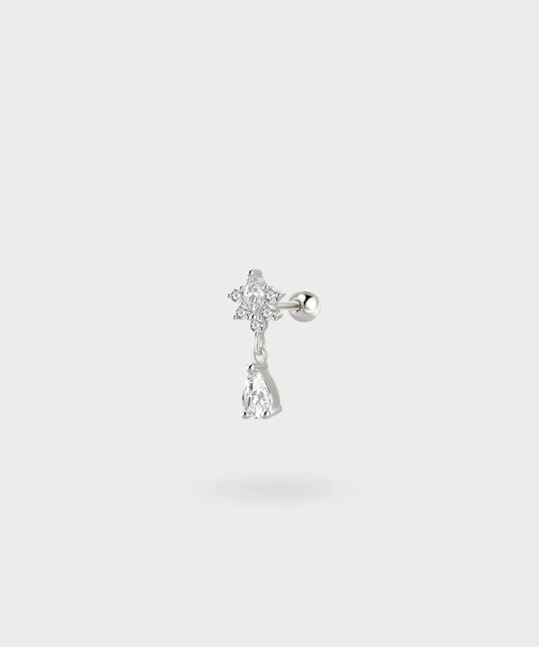 Helix piercing Nayra with a pear-shaped zircon for understated elegance