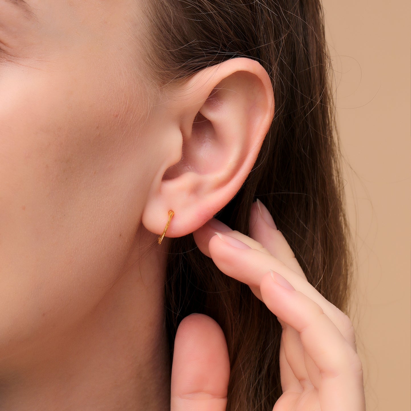 Versatile silver hoops perfect for both festivals and office attire.