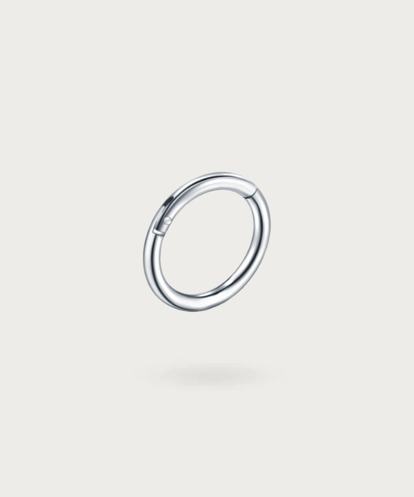 Close-up of the Paulina Forward Helix Hoop Piercing, highlighting the superior quality of the silver titanium