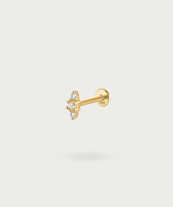 ear Earlobe piercing with precious stones