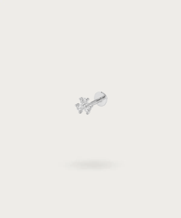"Flat silver Labret Piercing presented on a white background"