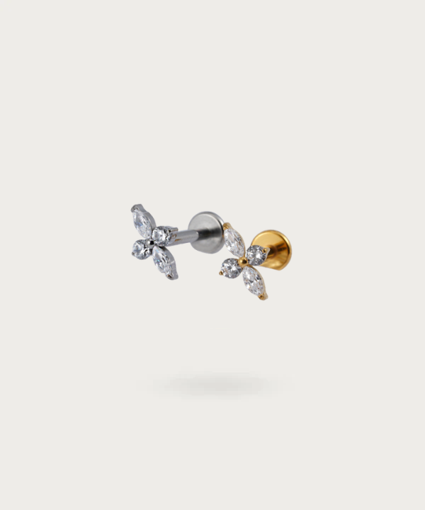 Close-up of the Forward Helix Flower Piercing, showing its high-quality titanium finish.