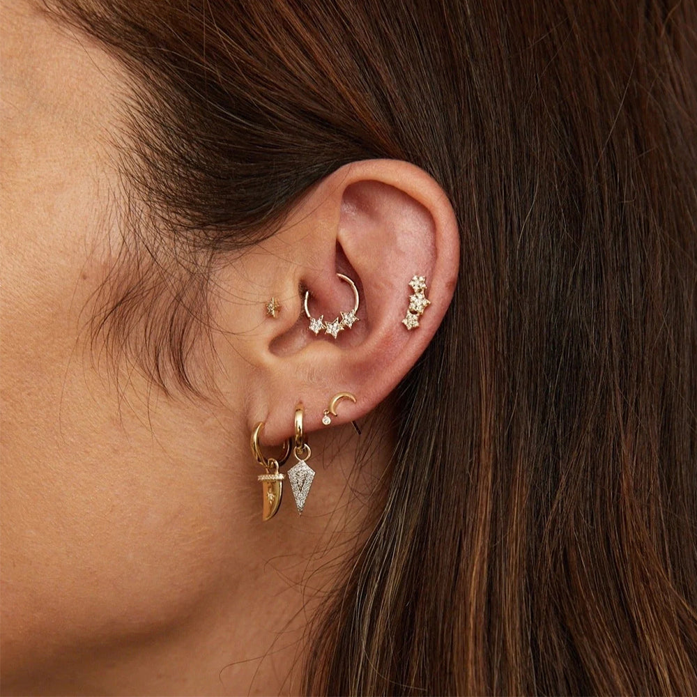 The Star Hoop Helix Piercing worn for a casual look.