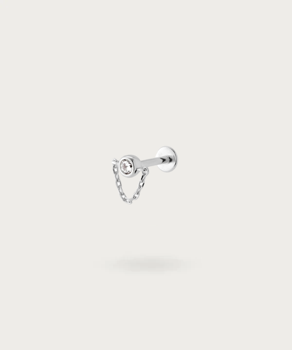 "Flat Piercing with Hanging Chain silver attractively on a white background"