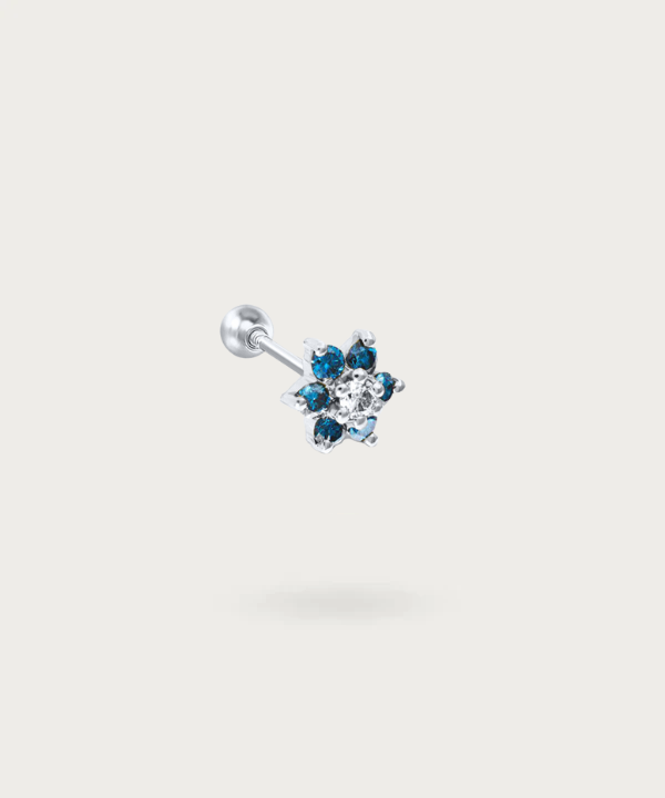 "Flat Flower and Zircons Piercing in silver on white background"