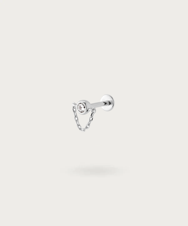 "Conch Piercing with Hanging Chain silver attractively on a white background"