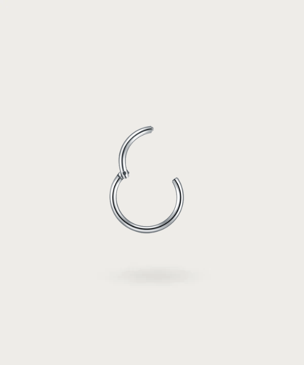 Close-up of the Paulina Daith Hoop Piercing, silver clicker