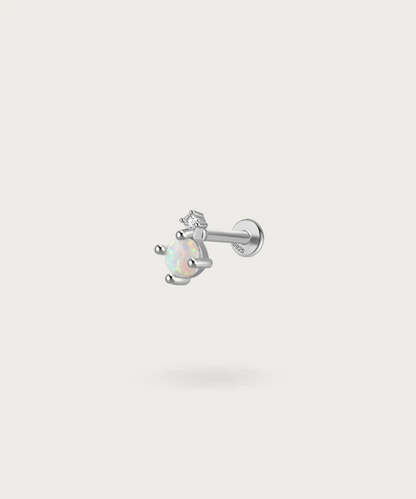 "Details of the silver Opal Stone on the Tragus Piercing."