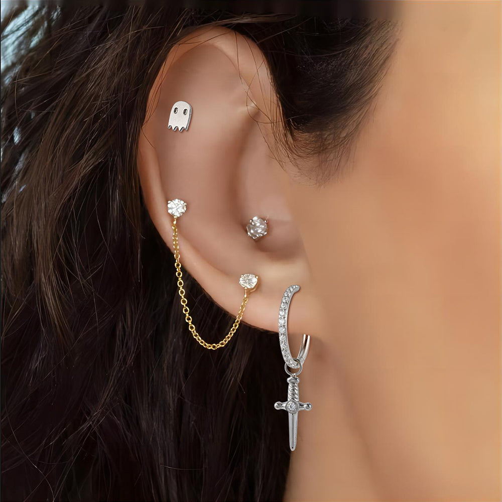 Forward Helix Ghost Piercing in Titanium worn on the left ear.