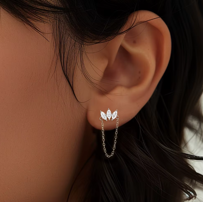 The 925 Silver Hanging Ear Piercing Worn by a Woman