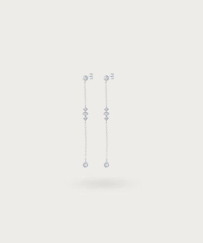 Daniela's sterling silver long earrings with cascading zirconias on a delicate chain.