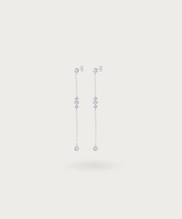 Daniela's sterling silver long earrings with cascading zirconias on a delicate chain.