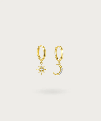Esther's Sun and Moon hoop earrings shine brilliantly, portraying the celestial harmony of day and night.