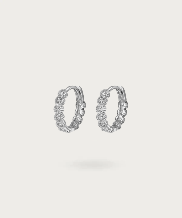 Dive into a spectacle of light with Angelina's sterling silver hoops adorned with medium-sized zirconias.