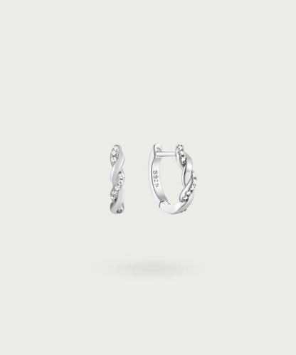 Modern and sophisticated: Liliana's silver hoops with zirconia highlights.