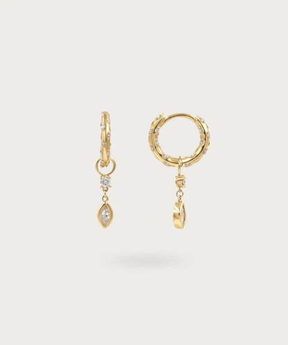 Step into elegance with Liza's hoop earrings, featuring a radiant blend of white zirconia and emerald green petal pendants.