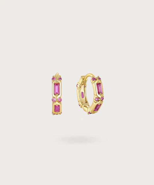 Lluminada's 9mm gold-plated hoop earrings, elegantly showcasing large rectangular red or blue zirconia stones for a striking appearance.