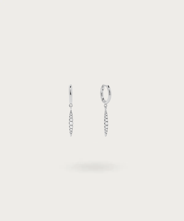 Discover the beauty of geometric elegance with Gabriela's hoop earrings, a seamless blend of sterling silver and sparkling zirconia.