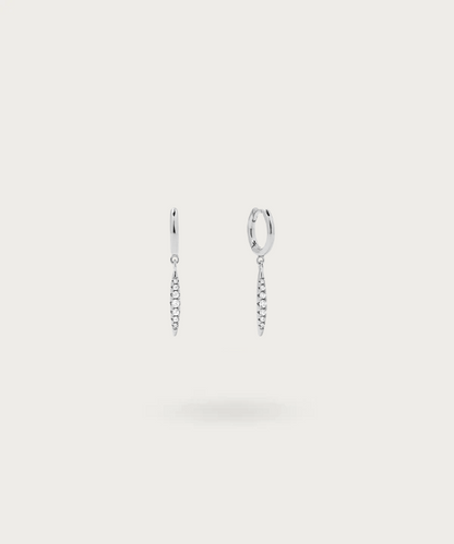 Discover the beauty of geometric elegance with Gabriela's hoop earrings, a seamless blend of sterling silver and sparkling zirconia.