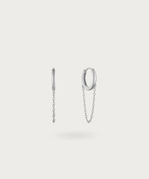 Contemporary Lusiana hoops with chain detail, playing with gravity and design.