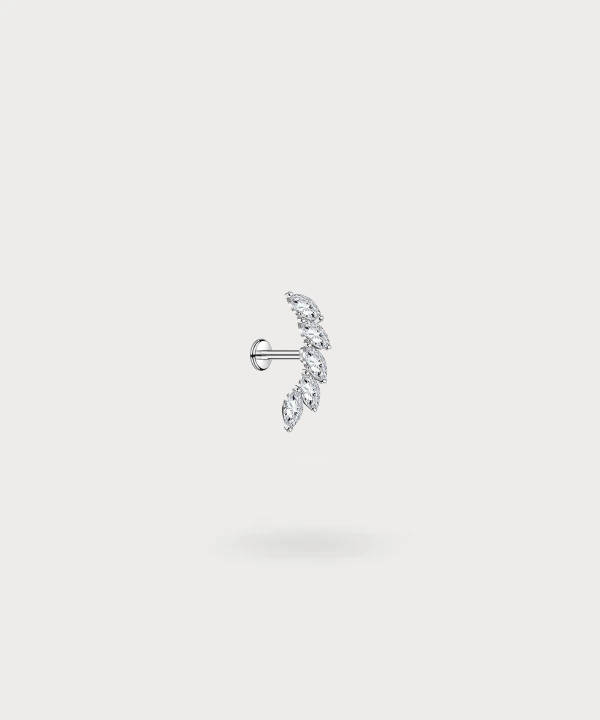 "Rita, a forward helix piercing that combines modernity and elegance."