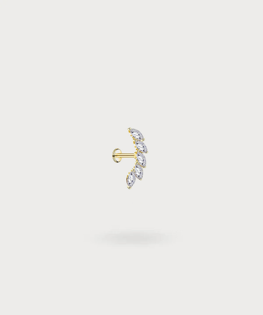 "Rita forward helix piercing with shimmering marquise zirconia in titanium."