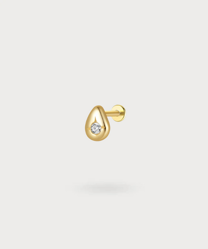 Montse Forward-helix piercing, a water drop design in gold/silver with a central zircon