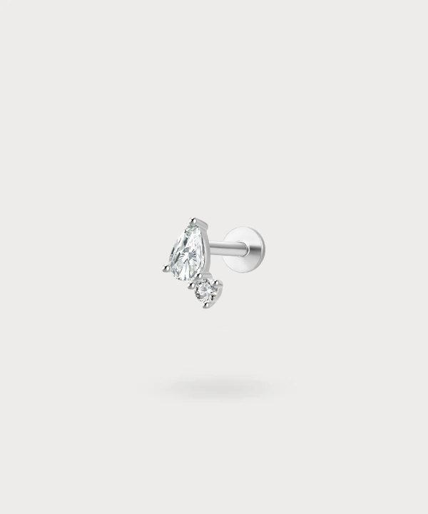 Harmony and sparkle with the Minerva forward helix piercing in gold or silver