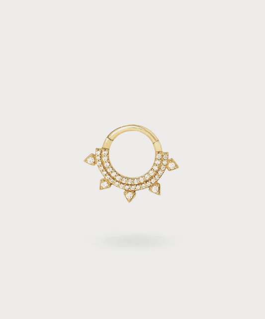 Alaia gold Daith piercing, where every detail radiates elegance