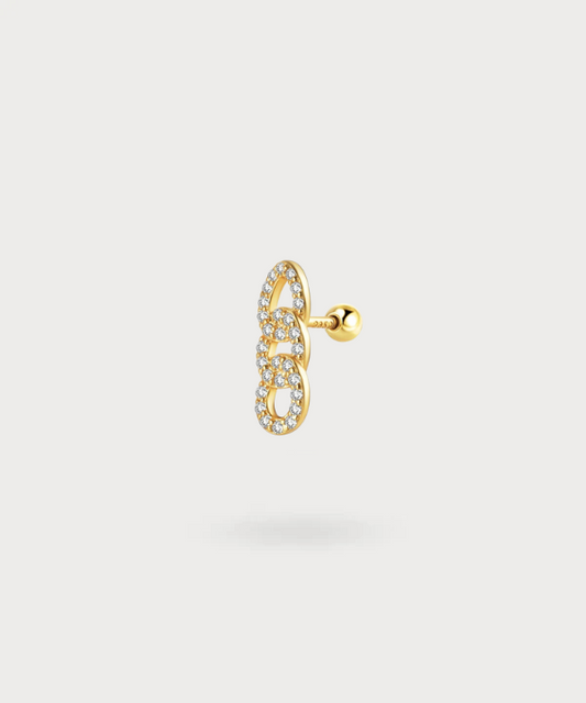 Idoia gold earlobe piercing with zircons, refined elegance