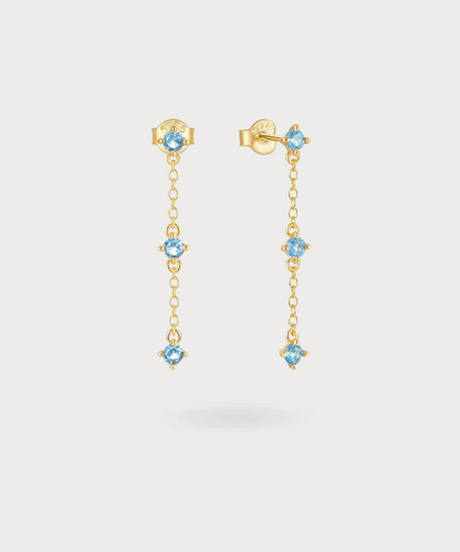 Mariel dangling earrings, where each stone tells a story of light