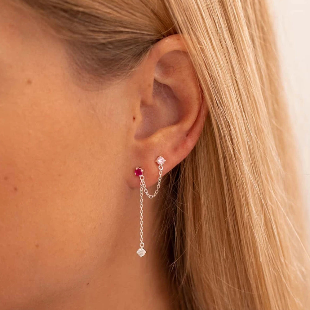 The 925 Silver Hanging Ear Piercing Worn by a Woman