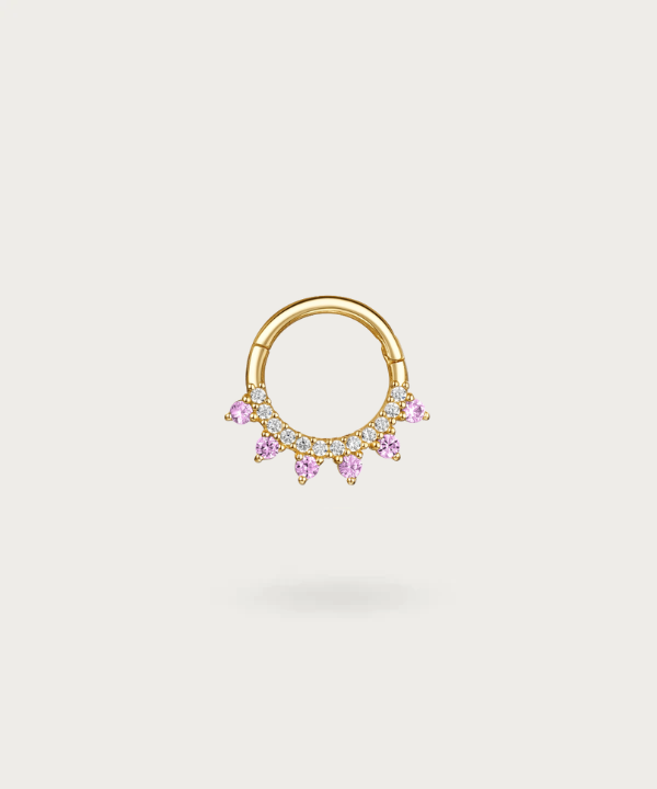 Gold hoop Daith piercing with embedded purple diamonds