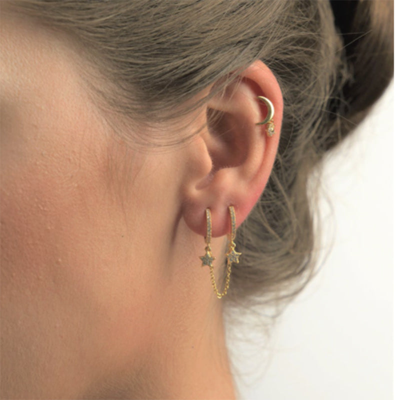 "Ear Piercing Double Hoop Chain worn, showing its elegance and boldness."