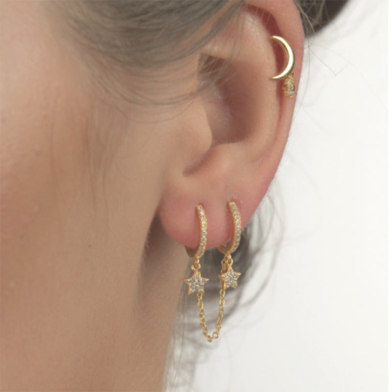 "Ear Piercing Double Hoop Chain worn on woman