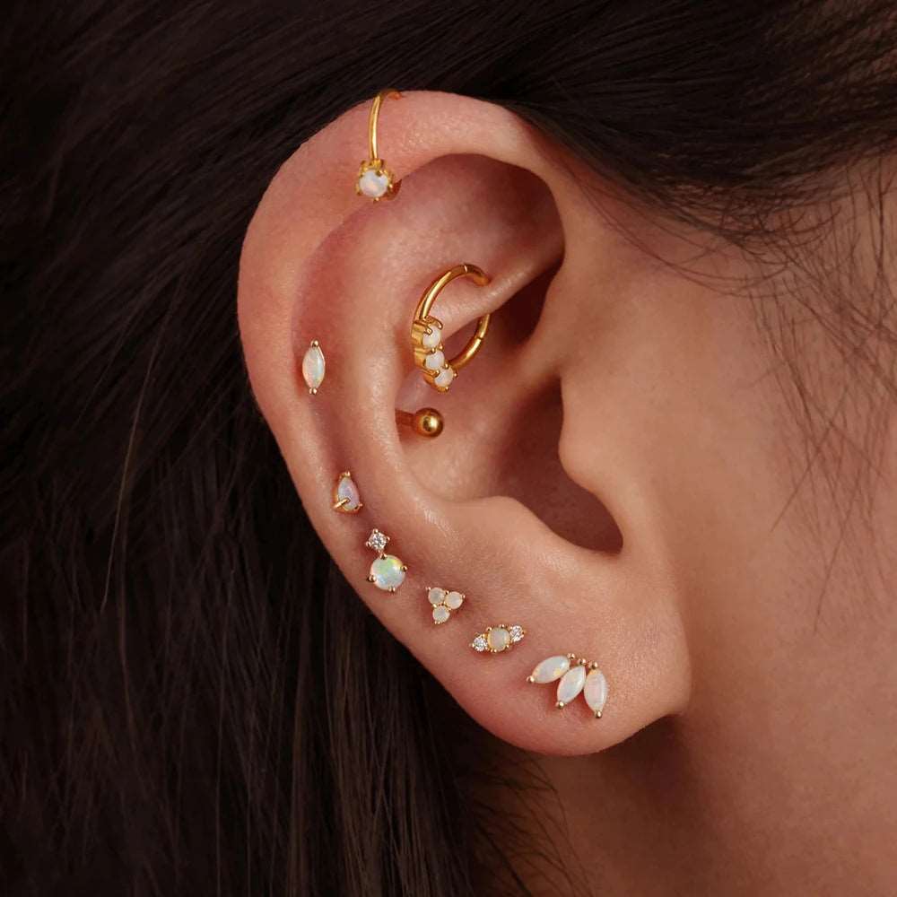 woman's ear Helix piercings