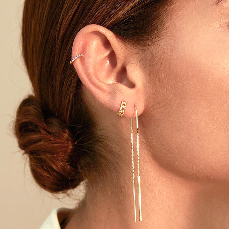 Embrace the beauty of simplicity with Carina's sterling silver earrings, a blend of fluidity and lightness.