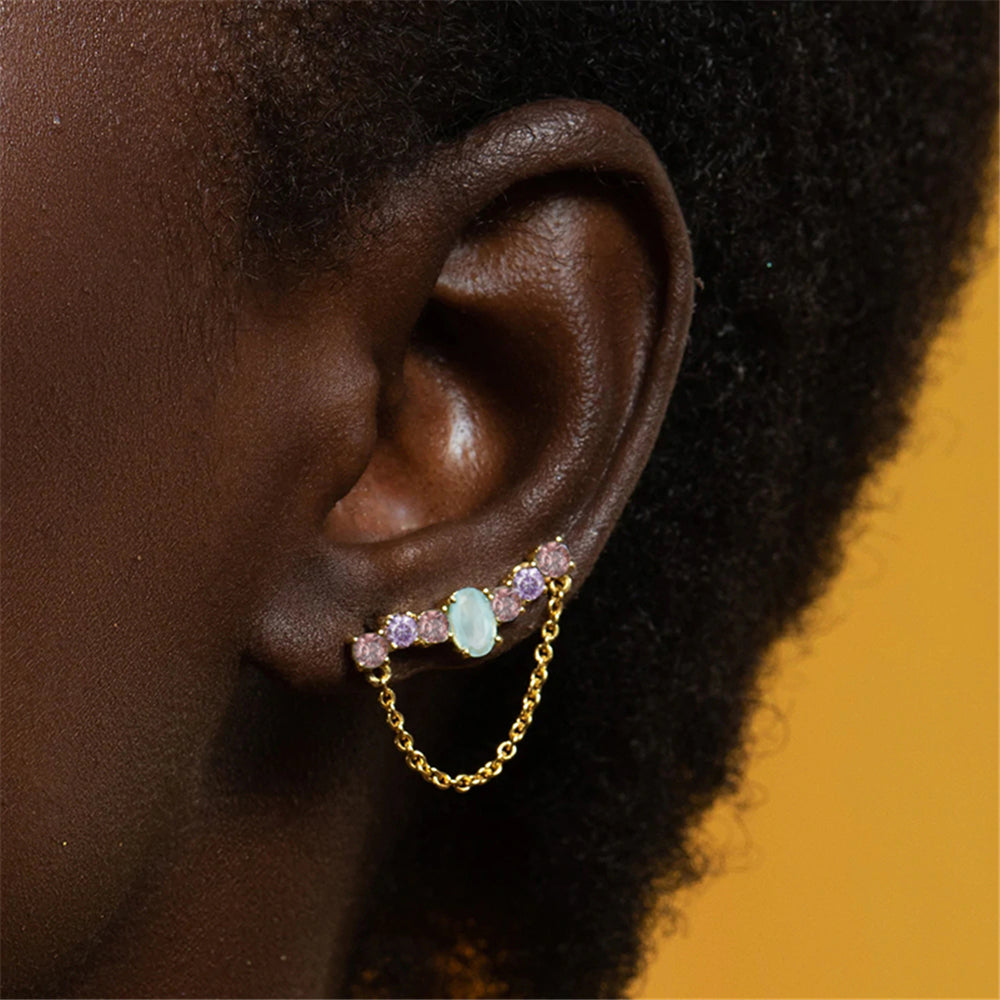 Elegant silver bar earrings with embedded purple and blue gemstones.