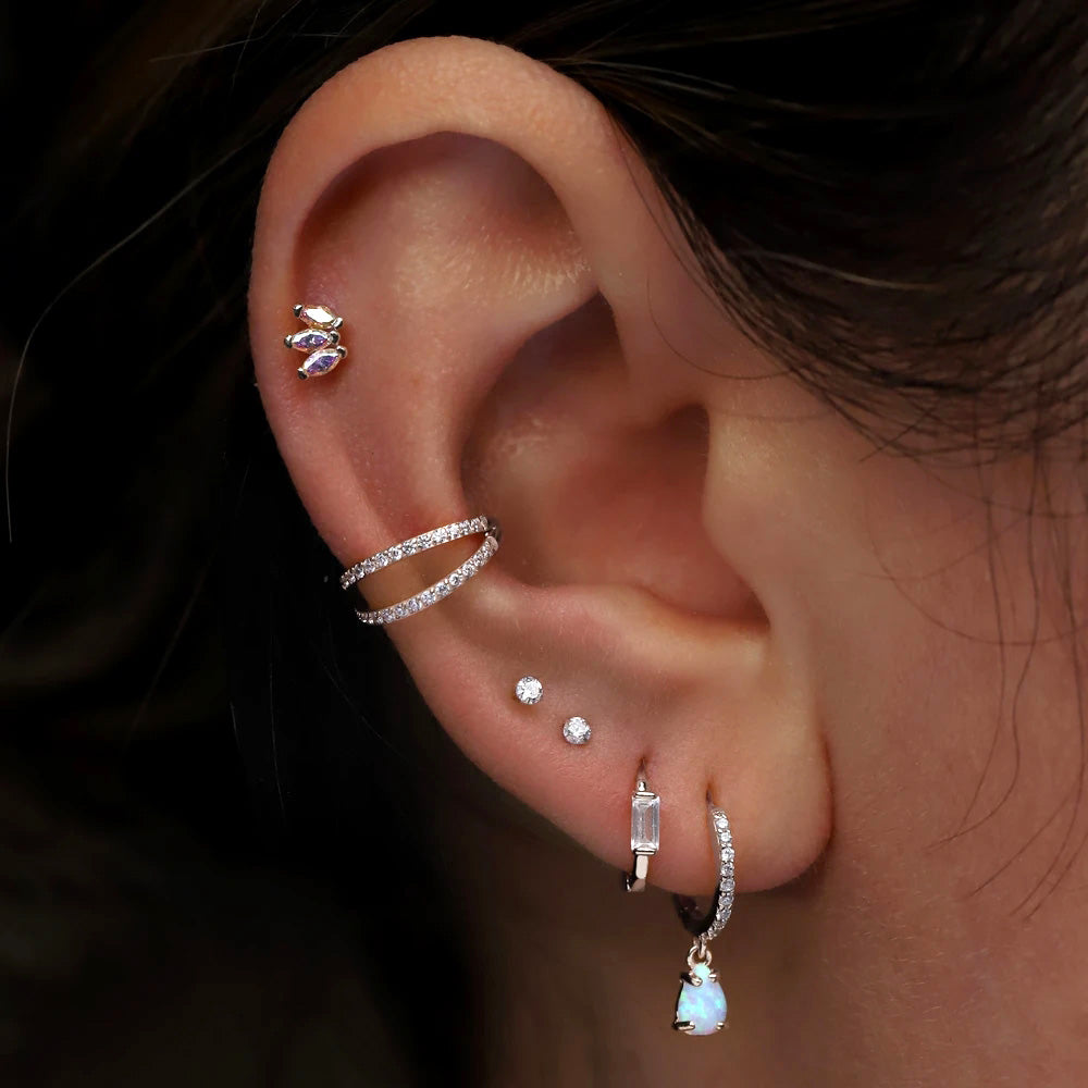 Sterling silver Rose Helix piercing with zircons, ideal for romantic dinners