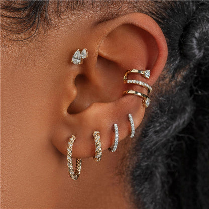 "925 Silver Conch Hoop worn on a female ear."