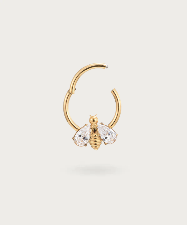 "Bee Hoop Snug Piercing with a glossy finish."