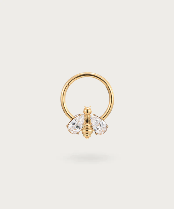 "Close-up view of the Bee Hoop Piercing."