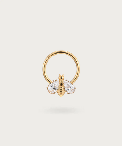 "Close-up view of the Bee Hoop Piercing."