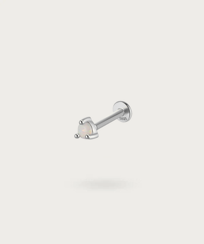 Tragus piercing with opal silver