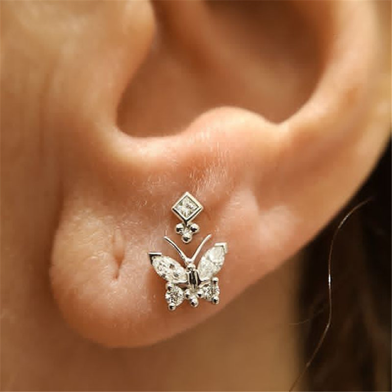 "Silver Butterfly Helix Piercing worn, demonstrating its elegant allure."