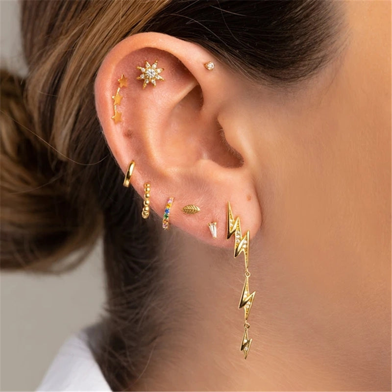 Sun Zircon Helix Piercing worn, showing the piece of jewelry in context