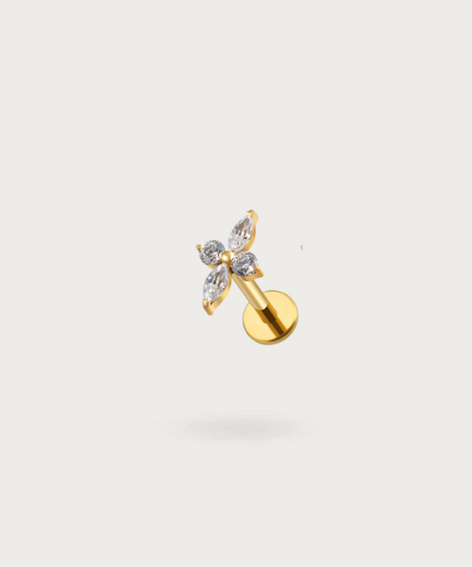 The Forward Helix Flower Piercing on a neutral background, highlighting its delicate floral design.